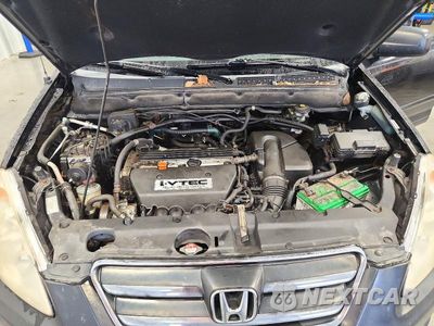 Zdjęcie 11 z 12 samochodu: 2006 HONDA CR-V LX VIN:JHLRD78546C043738 - miniatura