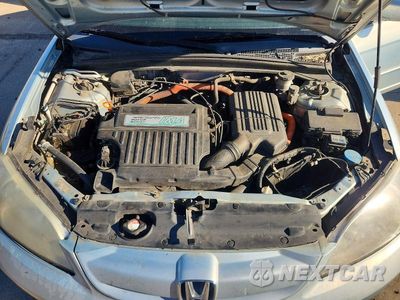 Zdjęcie 11 z 12 samochodu: 2004 HONDA CIVIC HYBRID VIN:JHMES95614S012703 - miniatura