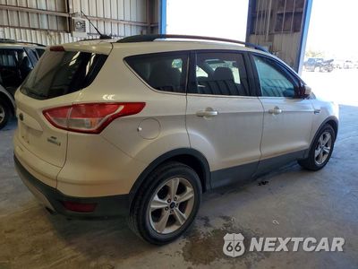 Trzecie zdjęcie samochodu z tyłu: 2016 FORD ESCAPE SE VIN:1FMCU0GX9GUA52777 - miniatura