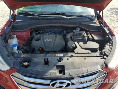 Zdjęcie 11 z 12 samochodu: 2013 HYUNDAI SANTA FE SPORT 2.4L VIN:5XYZT3LB1DG040665 - miniatura