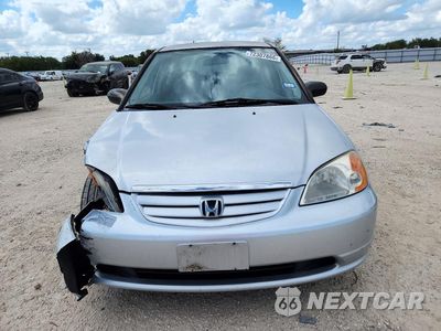 Piąte zdjęcie samochodu w środku: 2001 HONDA CIVIC LX VIN:1HGES16531L007230 - miniatura