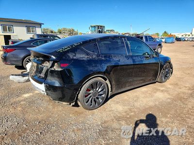 Trzecie zdjęcie samochodu z tyłu: 2022 TESLA MODEL Y VIN:7SAYGDEFXNF443416 - miniatura