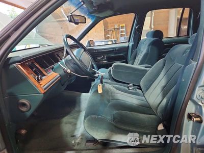 Zdjęcie 7 z 12 samochodu: 1994 LINCOLN TOWN CAR SIGNATURE VIN:1LNLM82W1RY647390 - miniatura