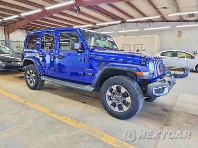 Czwarte zdjęcie samochodu z boku: 2018 JEEP WRANGLER UNLIMITED SAHARA VIN:1C4HJXENSJW260389 - miniatura