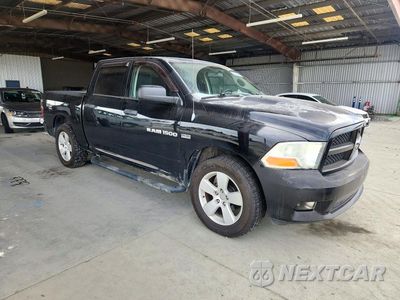 Czwarte zdjęcie samochodu z boku: 2012 DODGE RAM 1500 ST VIN:1C6RD6KT5CS267706 - miniatura