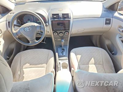 Zdjęcie 8 z 13 samochodu: 2009 TOYOTA COROLLA LE VIN:JTDBL40EX99085571 - miniatura