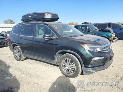 Czwarte zdjęcie samochodu z boku: 2017 HONDA PILOT EXL VIN:5FNYF6H66HB054512 - miniatura