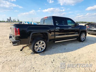 Trzecie zdjęcie samochodu z tyłu: 2017 GMC SIERRA K1500 DENALI VIN:3GTU2PEJ7HG388941 - miniatura