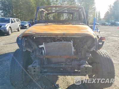 Piąte zdjęcie samochodu w środku: 2012 JEEP WRANGLER UNLIMITED SAHARA VIN:1C4BJWEG2CL216384 - miniatura