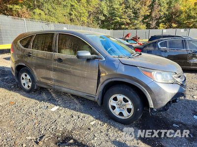 Czwarte zdjęcie samochodu z boku: 2014 HONDA CR-V LX VIN:2HKRM3H33EH535958 - miniatura