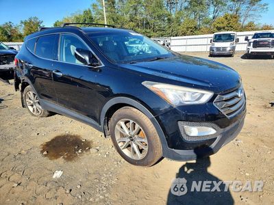 Czwarte zdjęcie samochodu z boku: 2015 HYUNDAI SANTA FE SPORT 2.0T VIN:5XYZU3LAXFG268574 - miniatura