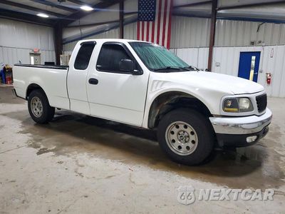 Czwarte zdjęcie samochodu z boku: 2004 FORD F-150 HERITAGE CLASSIC VIN:2FTRX17254CA87330 - miniatura