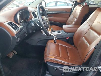 Zdjęcie 7 z 13 samochodu: 2015 JEEP GRAND CHEROKEE SUMMIT VIN:1C4RJFJM3FC732171 - miniatura