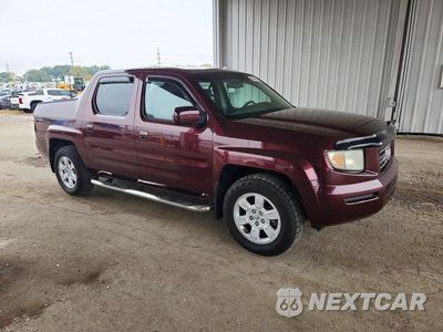 Czwarte zdjęcie samochodu z boku: 2007 HONDA RIDGELINE RTS VIN:2HJYK16457H527613 - miniatura