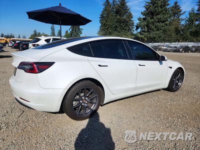 Trzecie zdjęcie samochodu z tyłu: 2021 TESLA MODEL 3 VIN:5YJ3E1EAXMF996579 - miniatura