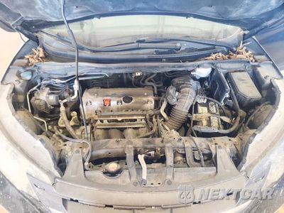 Zdjęcie 12 z 13 samochodu: 2012 HONDA CR-V EXL VIN:2HKRM4H77CH624230 - miniatura