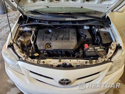 Zdjęcie 11 z 12 samochodu: 2012 TOYOTA COROLLA LE VIN:2T1BU4EEXCC808911 - miniatura