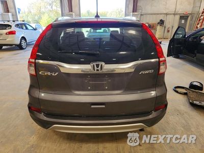 Zdjęcie 6 z 14 samochodu: 2016 HONDA CR-V EXL VIN:2HKRM4H76GH666684 - miniatura