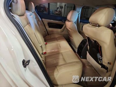 Zdjęcie 10 z 12 samochodu: 2015 LINCOLN MKS VIN:1LNHL9FT8FG600759 - miniatura