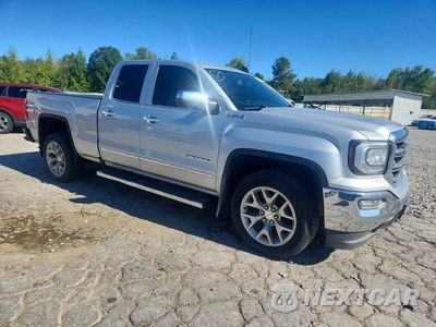 Czwarte zdjęcie samochodu z boku: 2018 GMC SIERRA K1500 SLT VIN:1GTV2NEC6JZ224533 - miniatura