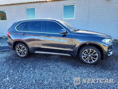 Czwarte zdjęcie samochodu z boku: 2018 BMW X5 XDRIVE35I VIN:5UXKR0C55J0X99960 - miniatura