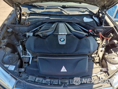Zdjęcie 12 z 13 samochodu: 2015 BMW X5 XDRIVE50I VIN:5UXKR6C58F0J74785 - miniatura