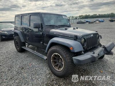 Czwarte zdjęcie samochodu z boku: 2015 JEEP WRANGLER UNLIMITED RUBICON VIN:1C4BJWFG8FL505417 - miniatura