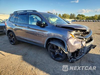 Czwarte zdjęcie samochodu z boku: 2019 HONDA PASSPORT ELITE VIN:5FNYF8H08KB015726 - miniatura