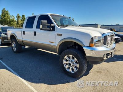 Czwarte zdjęcie samochodu z boku: 2004 FORD F350 SRW SUPER DUTY VIN:1FTSW31P64ED05967 - miniatura