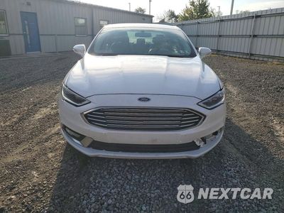 Piąte zdjęcie samochodu w środku: 2017 FORD FUSION TITANIUM HEV VIN:3FA6P0RU4HR399914 - miniatura