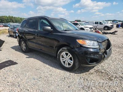 Czwarte zdjęcie samochodu z boku: 2012 HYUNDAI SANTA FE GLS VIN:5XYZG4AG7CG124898 - miniatura
