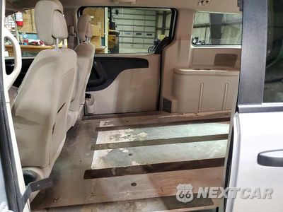 Zdjęcie 11 z 13 samochodu: 2012 DODGE RAM VAN VIN:2C4JDGAG0CR318286 - miniatura
