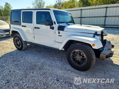 Czwarte zdjęcie samochodu z boku: 2016 JEEP WRANGLER UNLIMITED SAHARA VIN:1C4BJWEG9GL328508 - miniatura