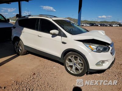 Czwarte zdjęcie samochodu z boku: 2018 FORD ESCAPE TITANIUM VIN:1FMCU0J96JUC09361 - miniatura