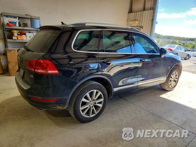 Trzecie zdjęcie samochodu z tyłu: 2013 VOLKSWAGEN TOUAREG V6 VIN:WVGEF9BP4DD001827 - miniatura