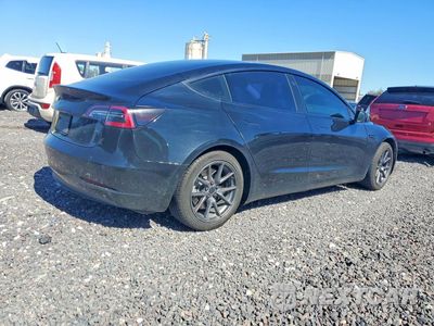 Trzecie zdjęcie samochodu z tyłu: 2021 TESLA MODEL 3 VIN:5YJ3E1EB9MF855804 - miniatura