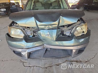 Zdjęcie 11 z 12 samochodu: 2004 MITSUBISHI OUTLANDER LS VIN:JA4LX31F54U052391 - miniatura