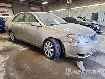 Czwarte zdjęcie samochodu z boku: 2004 TOYOTA CAMRY XLE V6 VIN:4T1BF32K54U588284 - miniatura