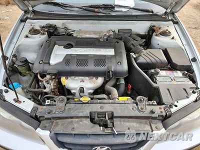 Zdjęcie 11 z 12 samochodu: 2005 HYUNDAI ELANTRA GLS VIN:KMHDN46D25U133407 - miniatura