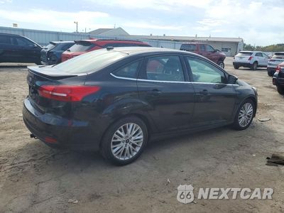 Trzecie zdjęcie samochodu z tyłu: 2018 FORD FOCUS TITANIUM VIN:1FADP3J20JL276103 - miniatura