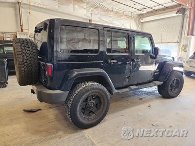Trzecie zdjęcie samochodu z tyłu: 2012 JEEP WRANGLER UNLIMITED SAHARA VIN:1C4HJWEG4CL240891 - miniatura