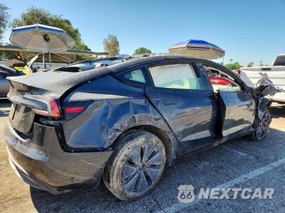 Trzecie zdjęcie samochodu z tyłu: 2025 TESLA MODEL 3 VIN:5YJ3E1EA0SF983756 - miniatura