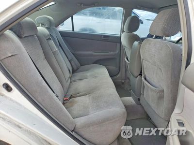 Zdjęcie 10 z 13 samochodu: 2004 TOYOTA CAMRY LE VIN:JTDBE32K540262774 - miniatura