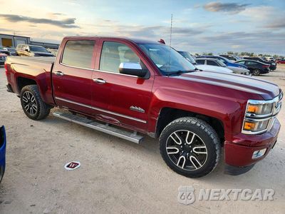 Czwarte zdjęcie samochodu z boku: 2015 CHEVROLET SILVERADO K1500 HIGH COUNTRY VIN:3GCUKTEC0FG447397 - miniatura
