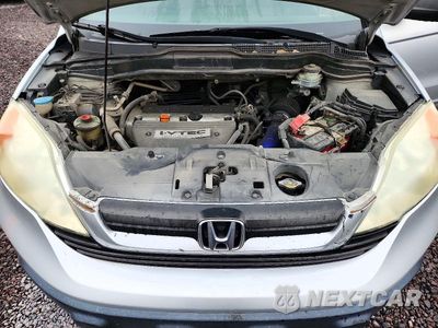 Zdjęcie 12 z 14 samochodu: 2009 HONDA CR-V LX VIN:5J6RE38399L001324 - miniatura