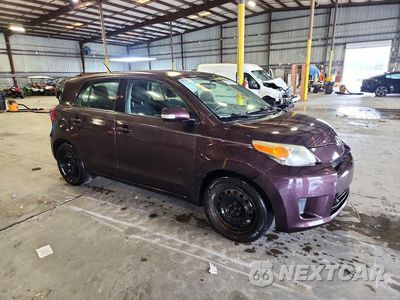 Czwarte zdjęcie samochodu z boku: 2012 SCION XD BASE VIN:JTKKU4B48C1021657 - miniatura