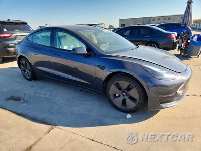 Czwarte zdjęcie samochodu z boku: 2023 TESLA MODEL 3 VIN:5YJ3E1EA3PF714920 - miniatura
