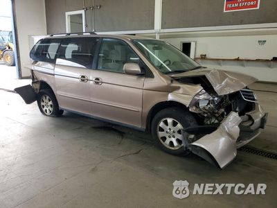 Czwarte zdjęcie samochodu z boku: 2004 HONDA ODYSSEY EX VIN:5FNRL18644B057418 - miniatura