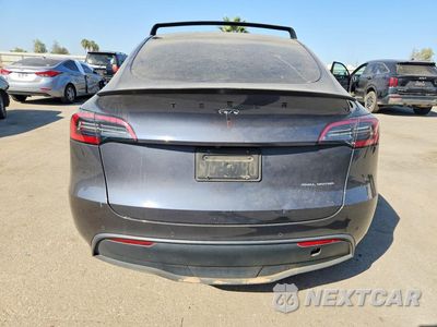 Zdjęcie 6 z 13 samochodu: 2022 TESLA MODEL Y VIN:7SAYGAEE4NF381906 - miniatura