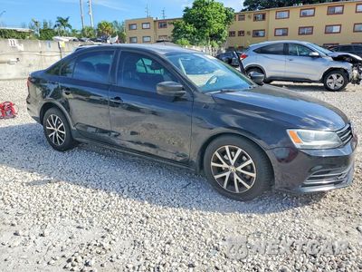 Czwarte zdjęcie samochodu z boku: 2016 VOLKSWAGEN JETTA SE VIN:3VWD67AJ2GM269511 - miniatura